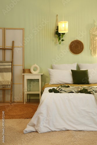 Comfortable bed, bedside ta...