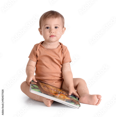 Cute baby with book on whit...