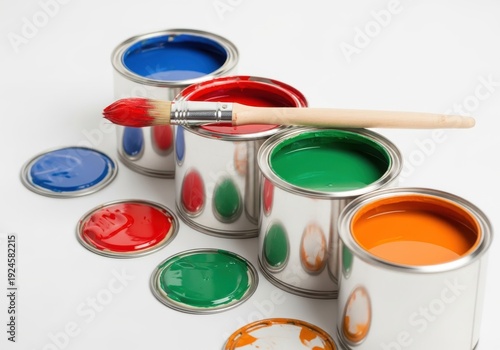 Wallpaper Mural Row of open metal containers filled with bright liquid colors rests on a clean white surface next to a brush Torontodigital.ca