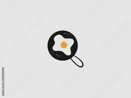 A top-down view illustration of a sunny-side up egg being cooked in a black frying pan, showing a simple and clean culinary design