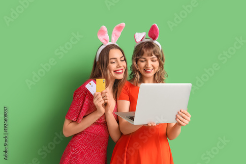 Happy young women in bunny ...