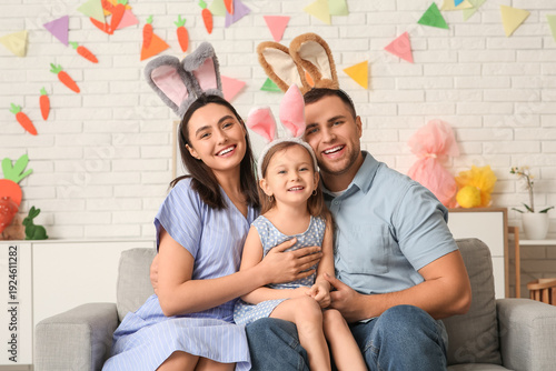 Happy family in Easter bunn...