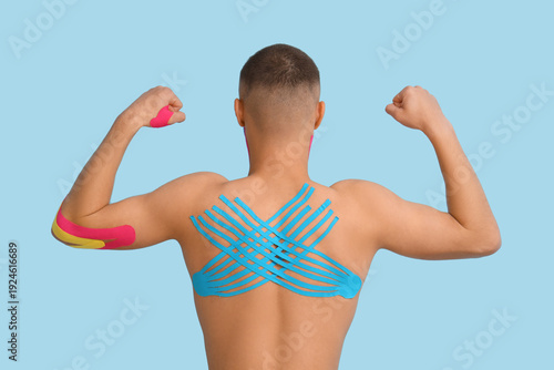 Young man with physio tape ...