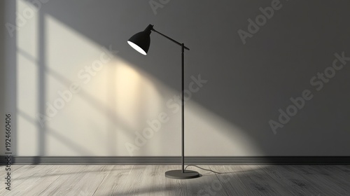 Modern floor lamp illuminating wall with sunlight and shadow