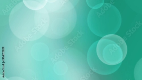 A close-up view of translucent circles on a green background with varying opacity and size