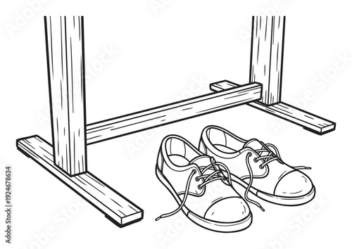 Black and white outline drawing of a pair of casual canvas shoes with untied laces resting under a simple wooden frame, ideal for educational content or printed materials.