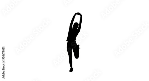 Silhouette of a woman in a yoga pose