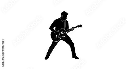 Silhouette of a man playing an electric guitar dynamically