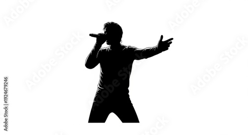 Silhouette of a man singing into a microphone