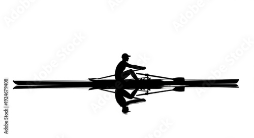 Silhouette of a person rowing a boat on calm water at sunset