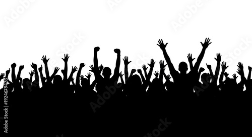 A large crowd of people with their hands raised in the air