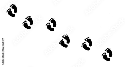 Black baby footprints walking diagonally across white background in simple minimalist design