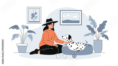 Cozy scene of a woman in an orange sweater sitting on the floor while petting her dalmatian dog in its bed.