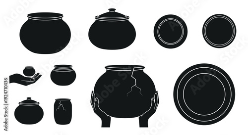 Collection of traditional black ceramic pots and jars for cooking