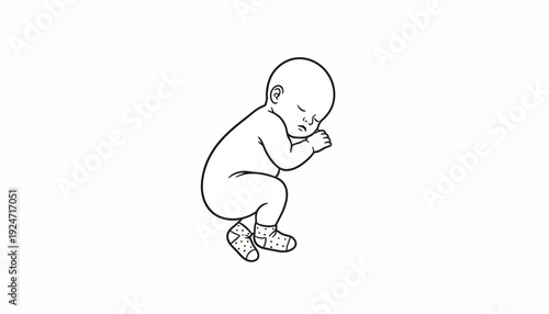 Newborn Baby Sleeping Peacefully in Fetal Position, Cute Infant in Pajamas with Socks