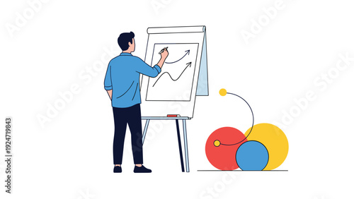 Young man in a blue shirt stands in front of a whiteboard and draws arrows showing positive growth and success in a business presentation.