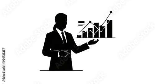 Businessman presenting a graph in a professional setting with charts