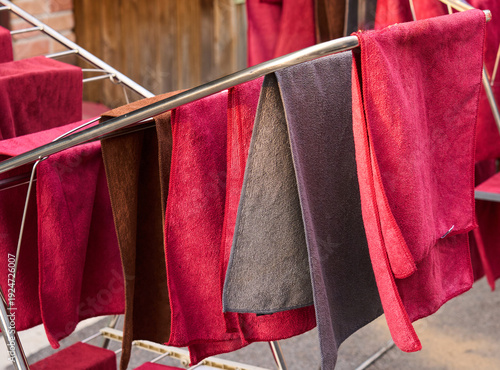 Colorful fabric towels drying on rack in everyday lifestyle