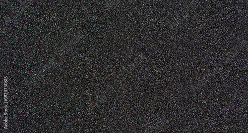 Photos abrasive paper. black sandpaper texture background.