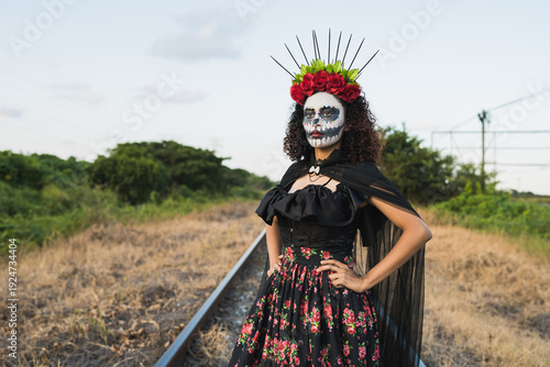 Obraz na plátne Catrina woman in traditional dress celebrating Day of the Dead