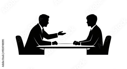 Silhouette of two businessmen in discussion