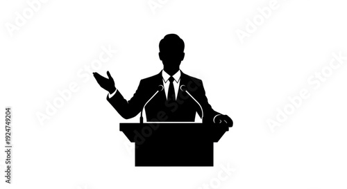 Silhouette of a man in a suit giving a presentation