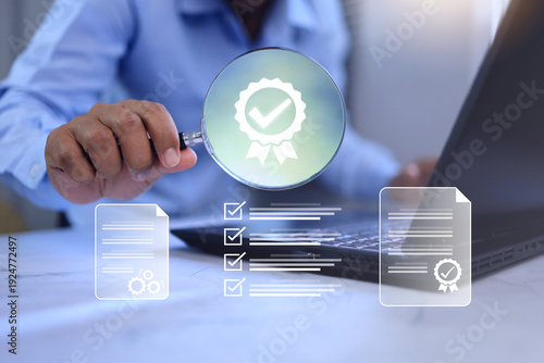 Fotografie audit concept with auditor use magnifying glass to check documents during annual