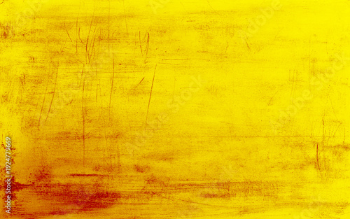 The old stained yellow distress grunge cement wall pattern for design work with copy space.