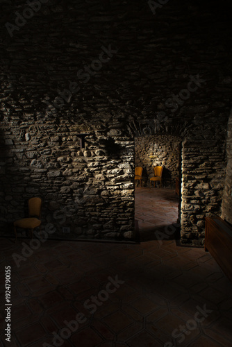 A room with period chairs inside a castle.