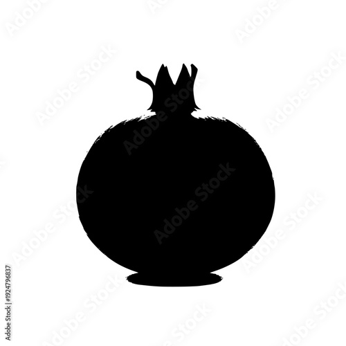 Elegant silhouette of a black cat perched atop a spherical object resembling a fruit.
