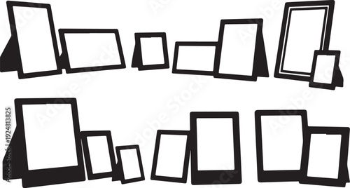 Collection of blank picture frames in various sizes displayed