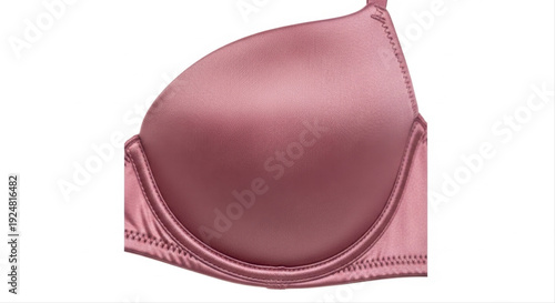 Sleek pink padded bra with smooth satin finish, isolated on a crisp white background, showcasing elegant design and craftsmanship