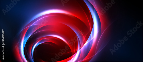 Bright swirling lights create dynamic abstract composition. Red, blue, pink hues blend into dark background. Energy radiates outward.