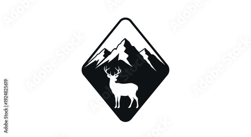 Deer Silhouette in Diamond Emblem with Mountain Peaks and Snow