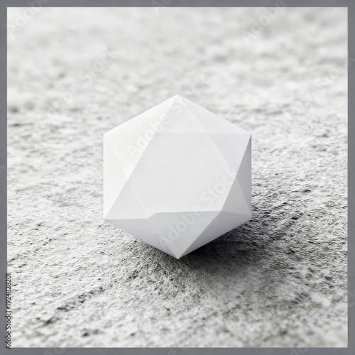 illuminated polyhedron on dark surface