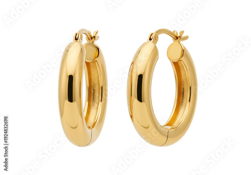 A pair of gold hoop earrings on a white background isolated on transparent background