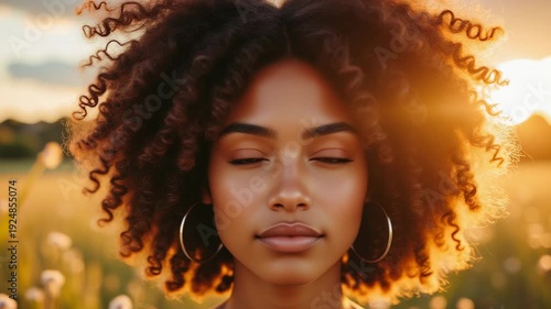 Natural Beauty Portrait – Curly-Haired Woman in Golden Wheat Field for Lifestyle, Wellness, and Empowerment Content