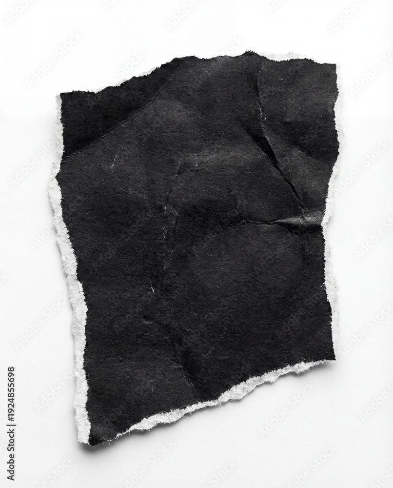 Obraz premium Torn Piece of Black Paper Isolated on White Background with Rough Edges and Minimal Contrast for Creative Design Use
