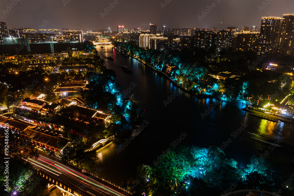 Fototapeta premium Hangzhou Grand Canal Night Cityscape with Illuminated Architecture