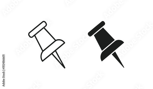 Two push pins in black and white on a pure for office or design use