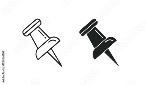 Two push pins in black and white on a plain background for office or organizational use