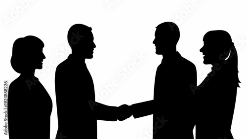 Silhouettes of businesspeople shaking hands in agreement