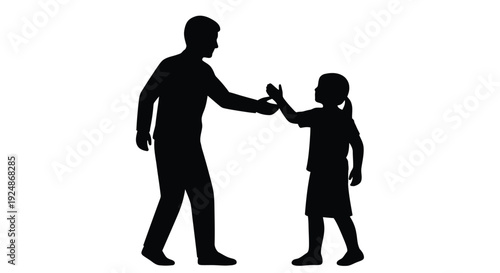 Silhouetted father and daughter giving each other a high five