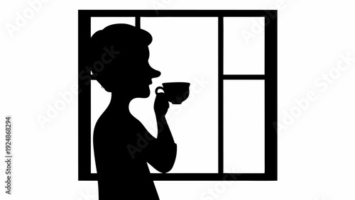 Woman enjoying coffee by the window in silhouette