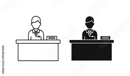 Two business people wearing face masks sitting at desks in black and white