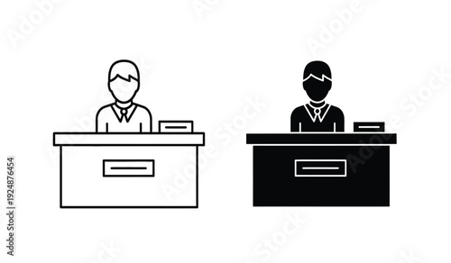 Two people wearing face masks sitting at counters in black and white
