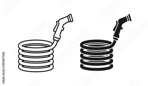 Black and white line drawing of two coiled hoses with fittings