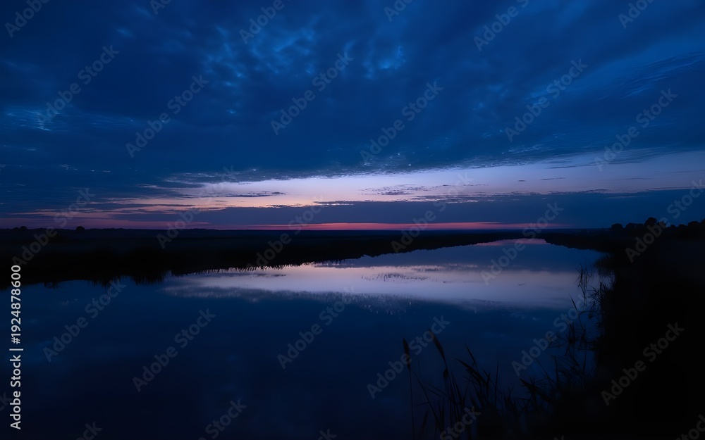 Fototapeta premium Deep Blue Dusk Over Reflecting Water
