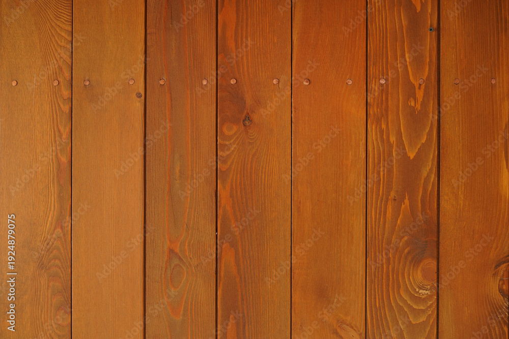 Fototapeta premium Warm wooden plank wall texture with natural grain rustic background