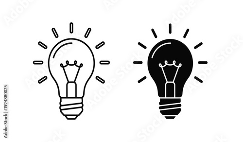 Two light bulbs one glowing and one not